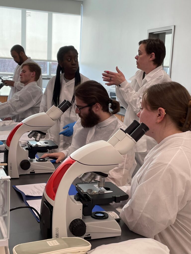 In the Biotechnology Lab at Virginia Western Community College, Dr. Heather Lindberg explains the total cells needed for students to seed their flasks.