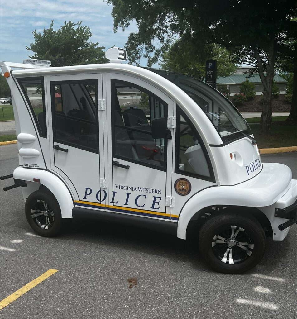 The MotoEV Electro Bubble Buddy LSV 4 Passenger Police Hard Door