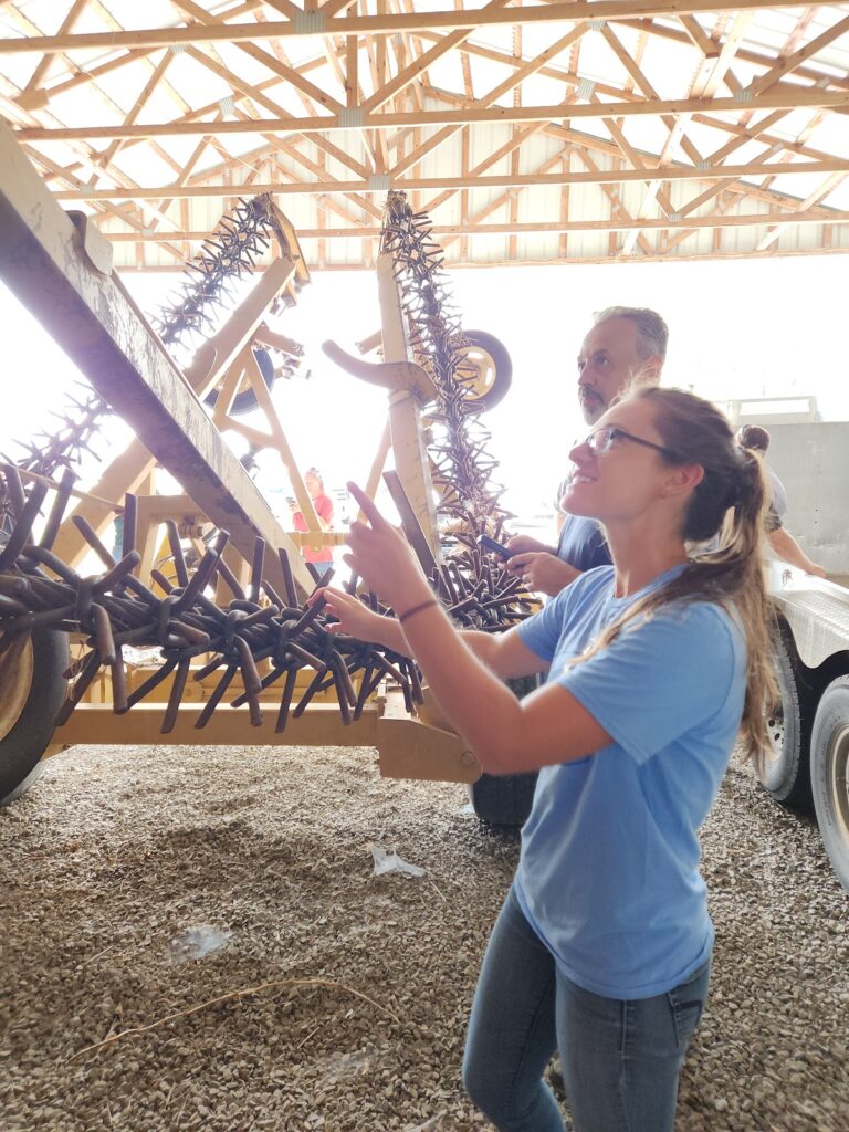 Dr. Mallory White and Dr. David Berry work on a Safe Farm Steward assessment.