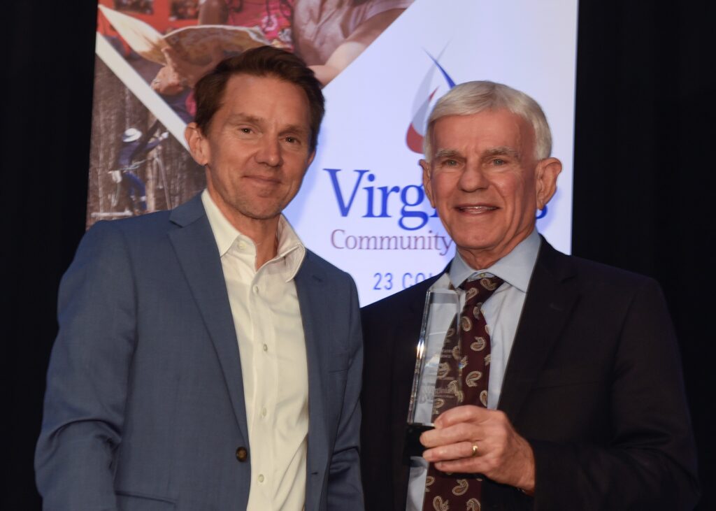 VCCS Senior Vice Chancellor Craig Herndon (from left), honors Dr. Robert Sandel, president of Virginia Western Community College.