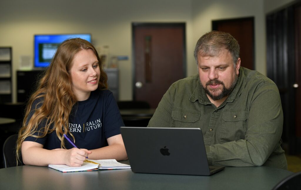 Fralin Futures success coach Schuyler van Montfrans (left) works with Virginia Western graduate Hannah Puskar.