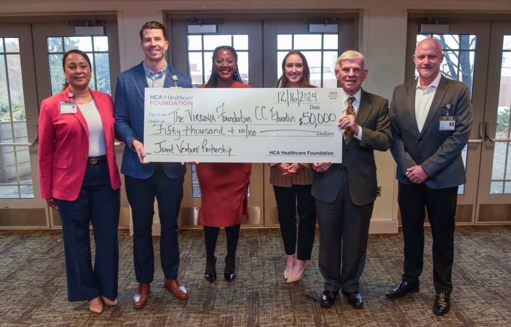 Officials with HCA Healthcare, Virginia Western Community College and Virginia Foundation for Community College Education acknowledge and celebrate the recent philanthropic investment in the Joint Ventures program. From left are: Dr. Yvette Dorsey, AVP of Academic Affairs, HCA Healthcare Capital Division; Collin McLaughlin, CEO, LewisGale Medical Center; Philmika Reid, Director of Healthcare Workforce and Community Engagement, Virginia Community College System; Gina Heckey, Director of Philanthropic Partnerships, The Virginia Foundation for Community College Education; Dr. Robert Sandel, President, Virginia Western Community College; and Chris Finley, AVP of Community Engagement, HCA Healthcare Capital Division. Photo credit: Clem Britt, Virginia Community College System.