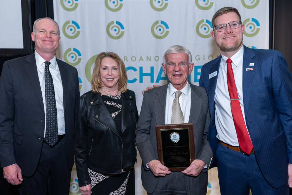 Paul Nester, RGC Resources, Inc. President and CEO and Past Chair of the Roanoke Regional Chamber (from left), Jane and Dr. Robert Sandel, and Eric Sichau, President and CEO of the Roanoke Regional Chamber, celebrate Dr. Sandel's award from the Roanoke Regional Chamber of Commerce. Photos by Geoff Meza Photography courtesy of Roanoke Regional Chamber of Commerce.