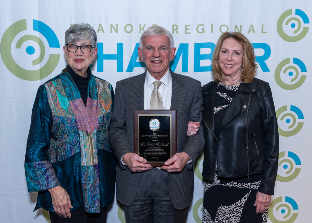 Joyce Waugh, retired President and CEO of the Roanoke Regional Chamber, celebrates with Dr. Robert and Jane Sandel as he receives the Chamber's Lifetime Achievement Award named in Waugh's honor. Photo by Geoff Meza Photography courtesy of Roanoke Regional Chamber of Commerce.