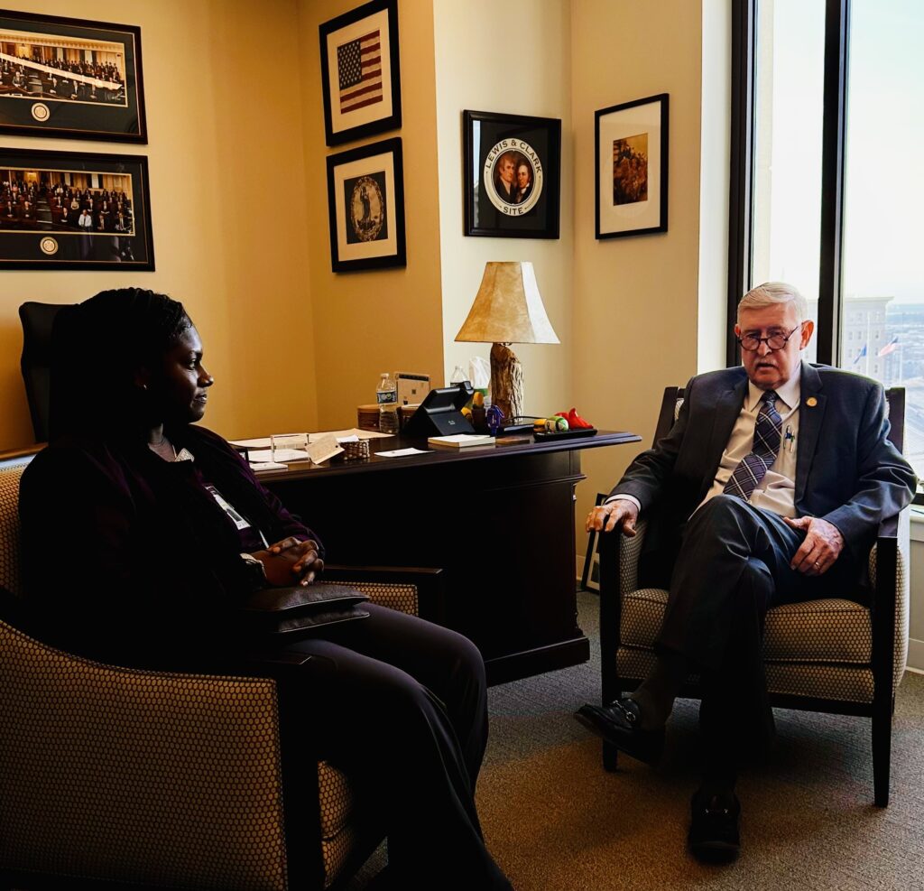 Virginia Western Practical Nursing student Uleksis Williams meets with Delegate Terry Austin.