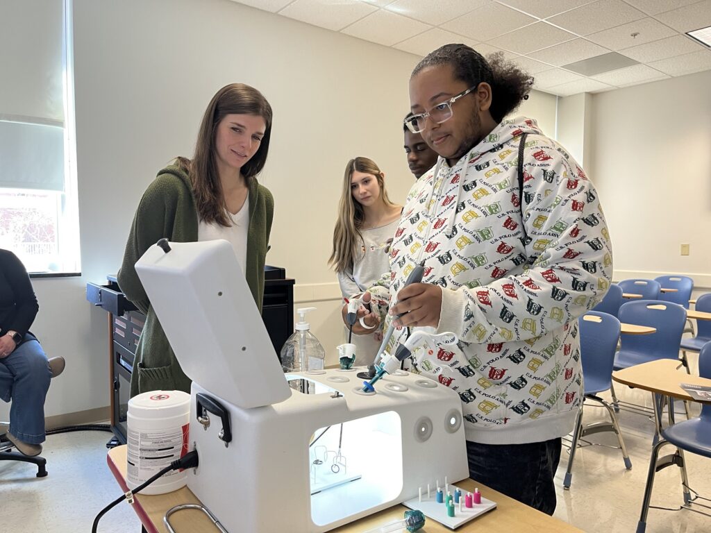 Roanoke City Public School students participate in a Surgical Technology Program station.