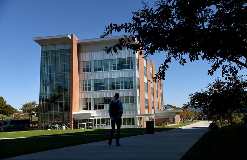 Student Walking Outside STEM Building